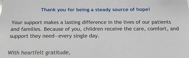 The printed message inside the card: thank you for being a steady source of hope, and a note that this support helps children receive care, comfort and support.